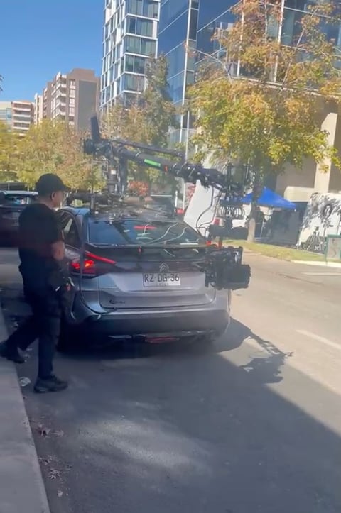 Camera rig mounted on a vehicle during an exterior production